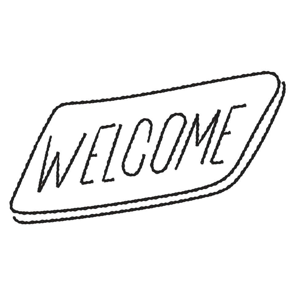 A doormat reading WELCOME