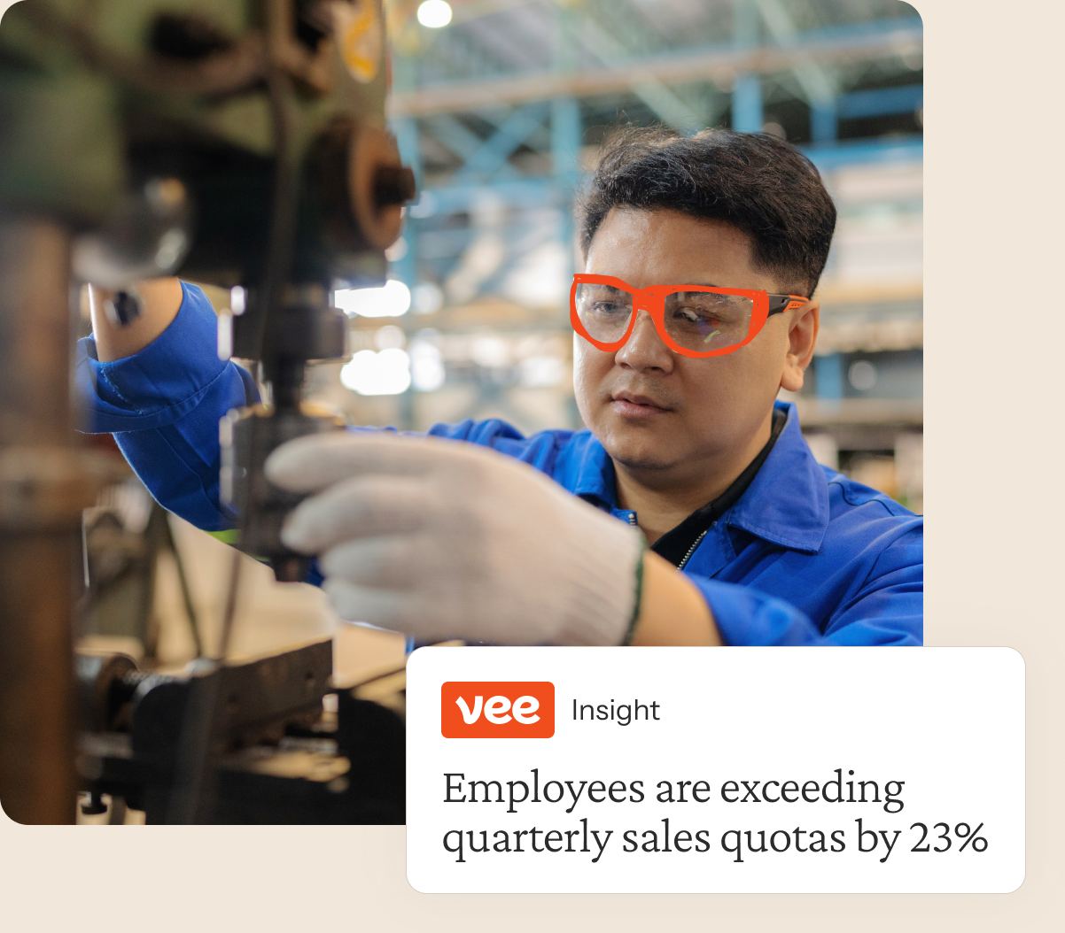 Manufacturing worker beside a Visier insight card