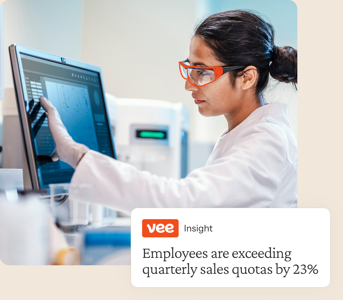 Scientist in a lab beside a Visier insight card